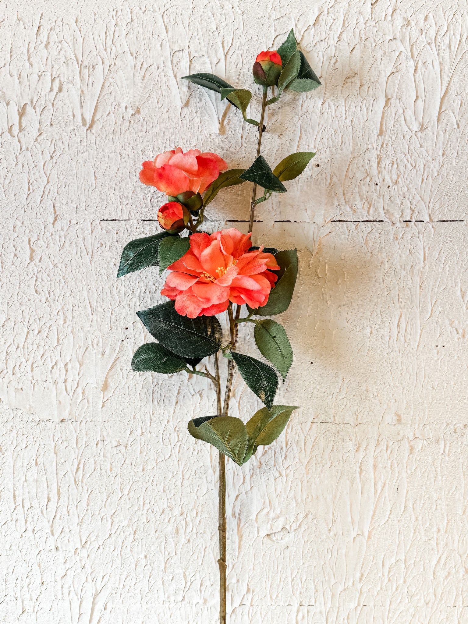 long stem coral silk carmellia flower at the rustic barn in killingworth ct