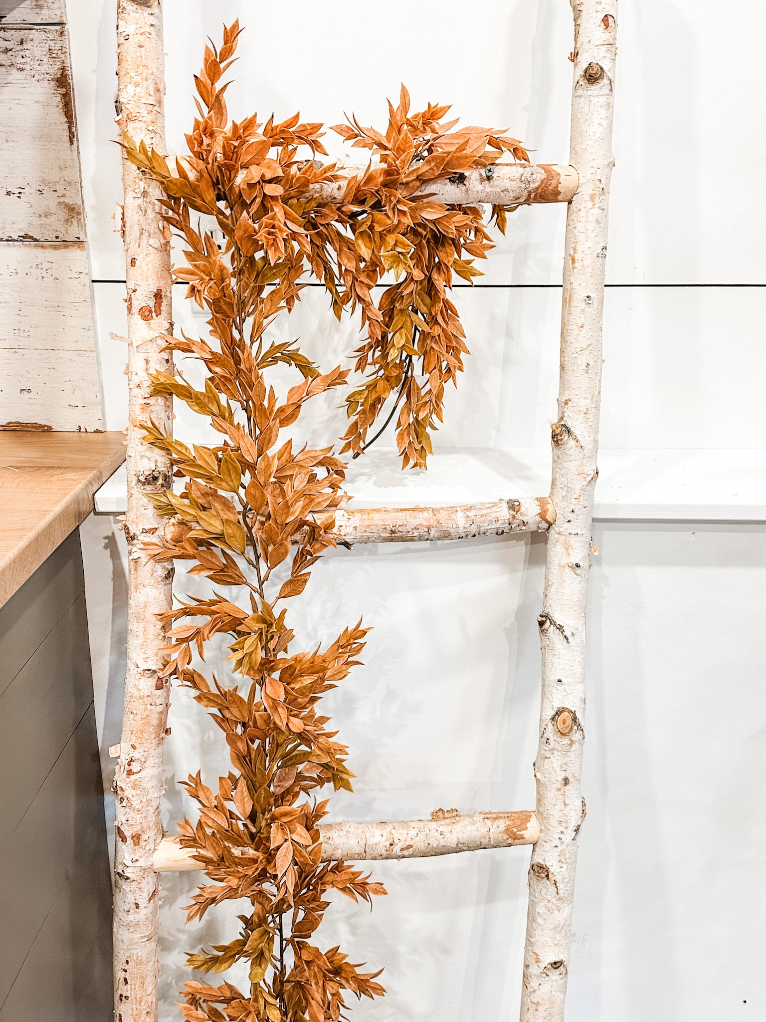 lush spear leaf golden color fall garland at the rustic barn in killingworth ct