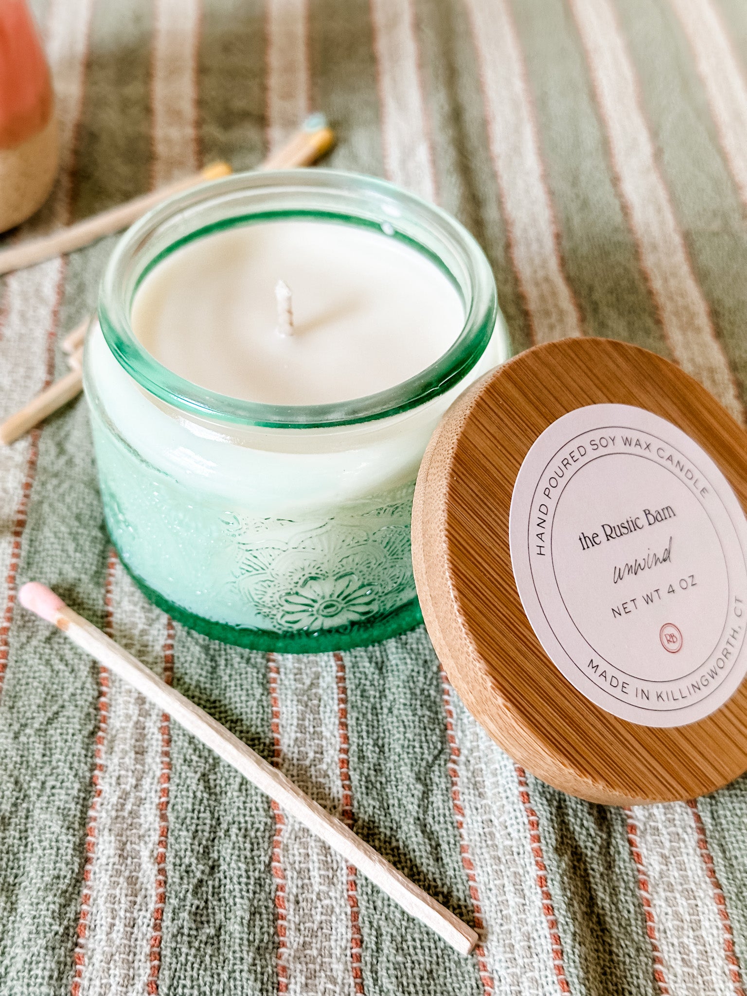 mango and coconut hand-poured soy candle at the rustic barn in killingworth ct