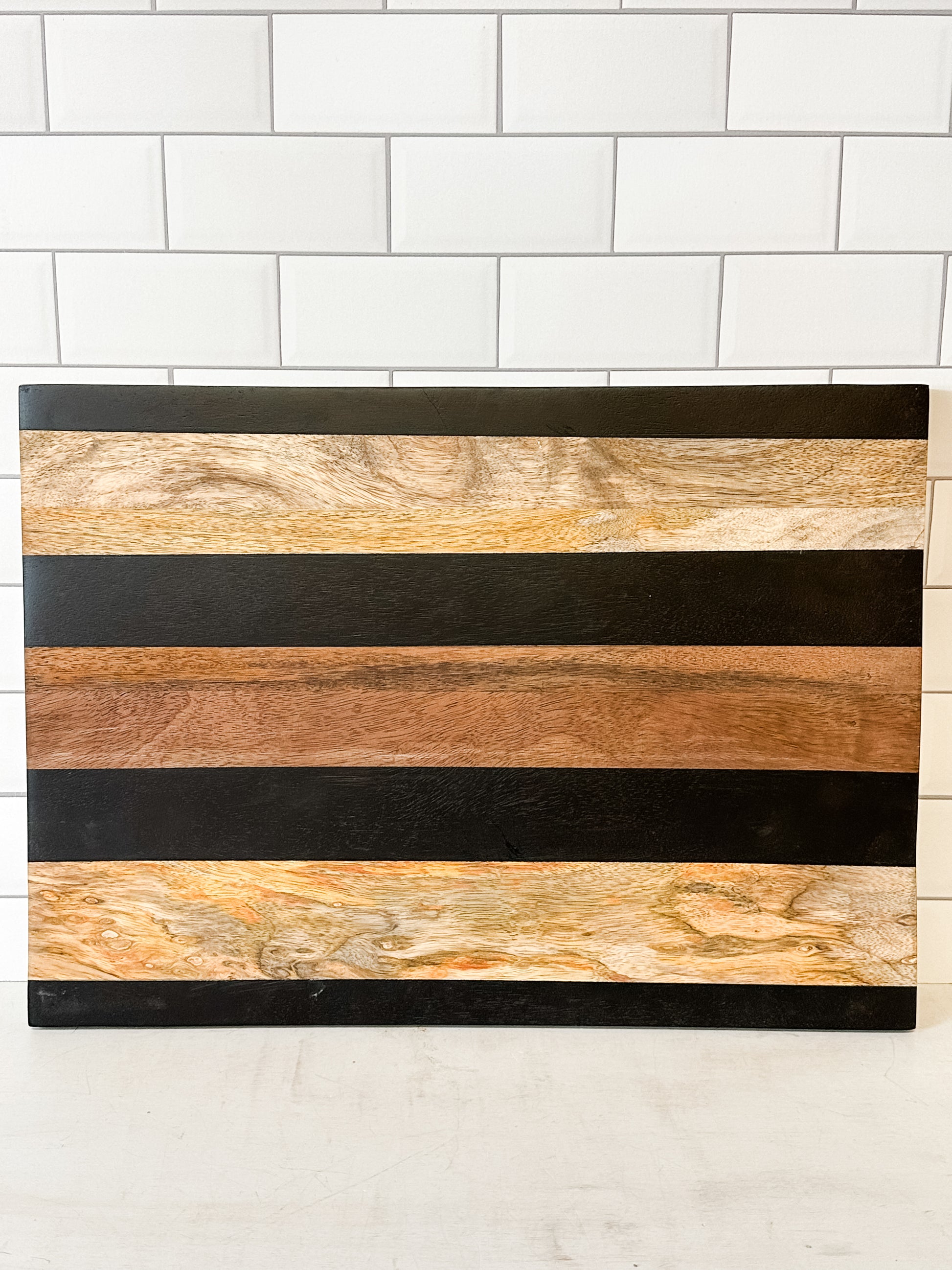 mango wood cheese and cutting board with stripes at the Rustic Barn in Killingworth CT