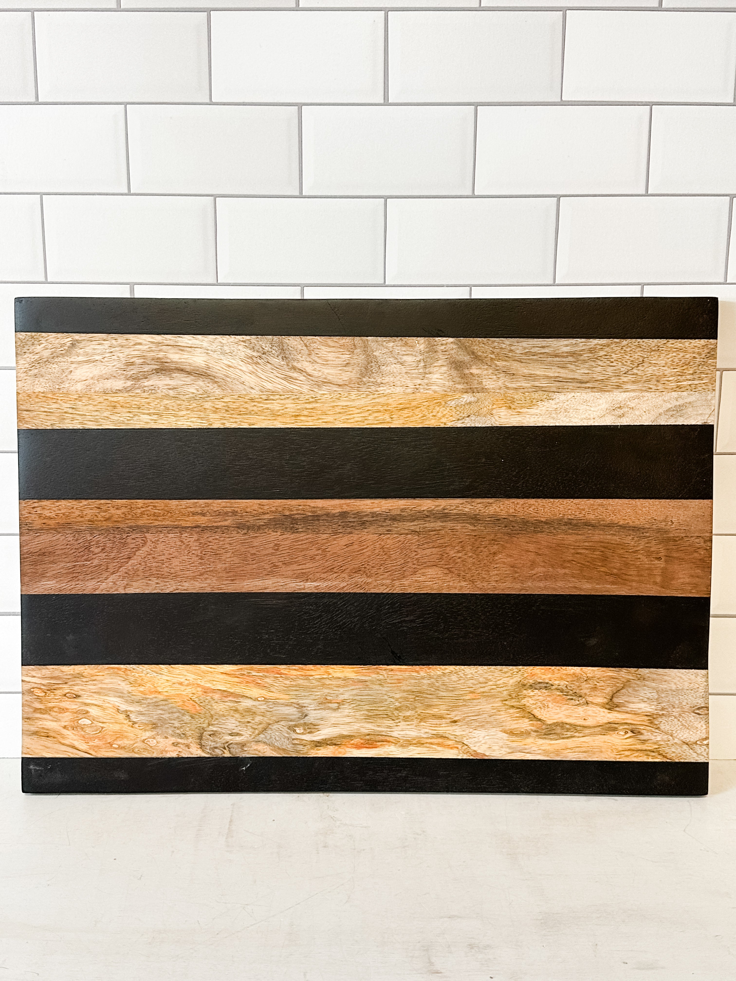 mango wood cheese and cutting board with stripes at the Rustic Barn in Killingworth CT