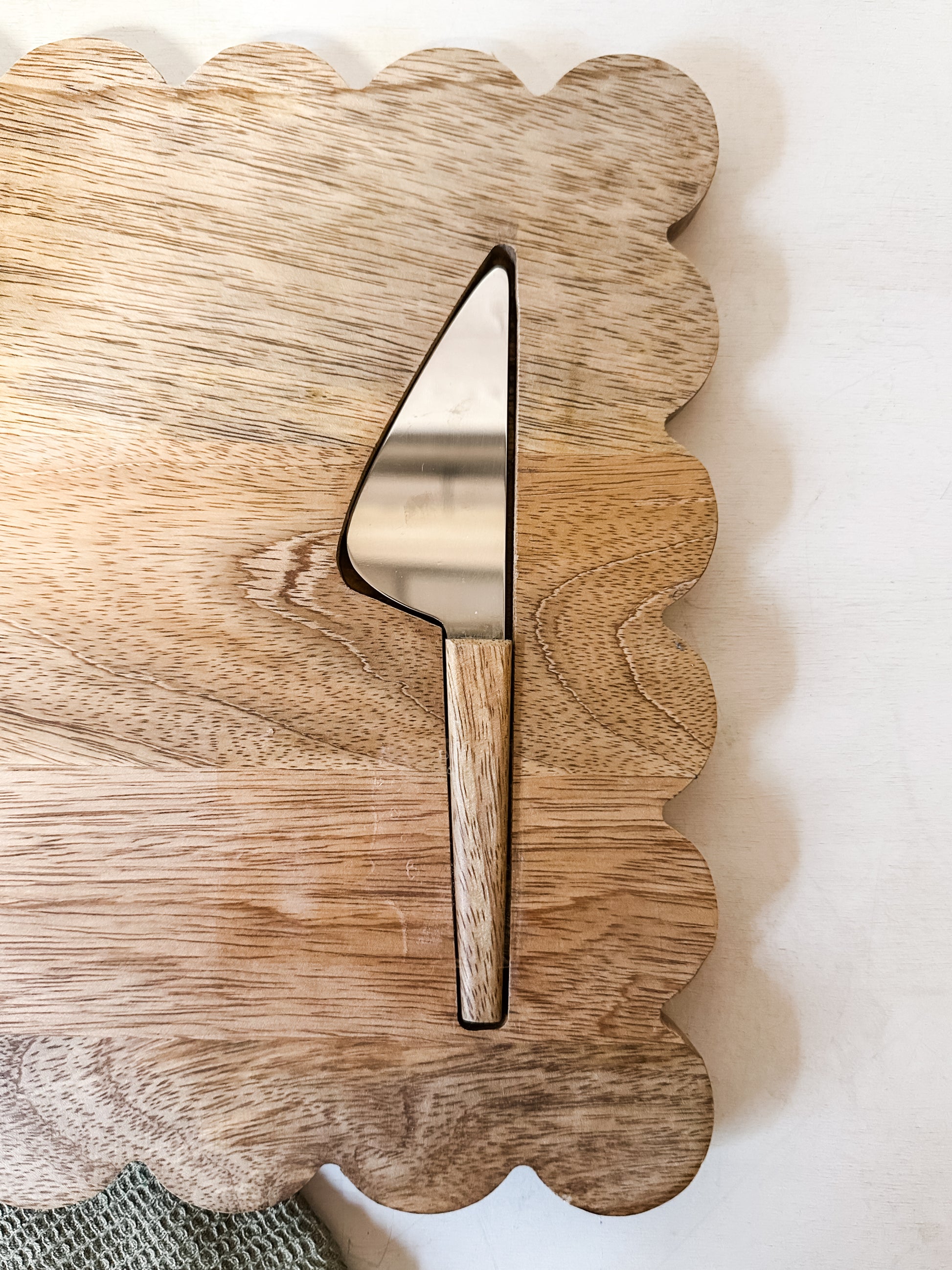 mango wood scalloped cheese and serving board with knife at the Rustic Barn in Killingworth CT
