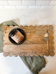 mango wood scalloped cheese and serving board with knife at the Rustic Barn in Killingworth CT