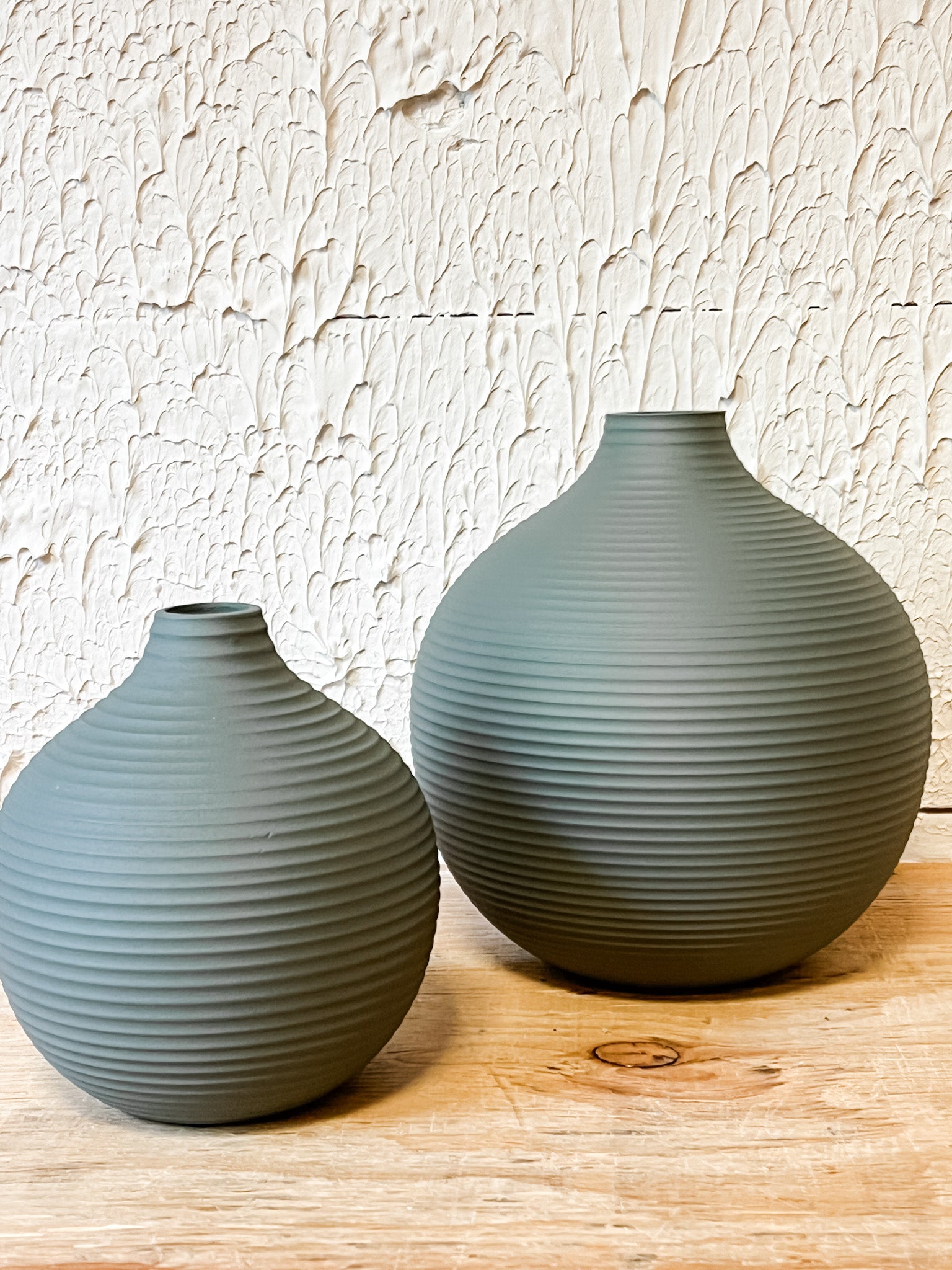 matte sleek gray ribbed metal vases at the rustic barn in killingworth ct