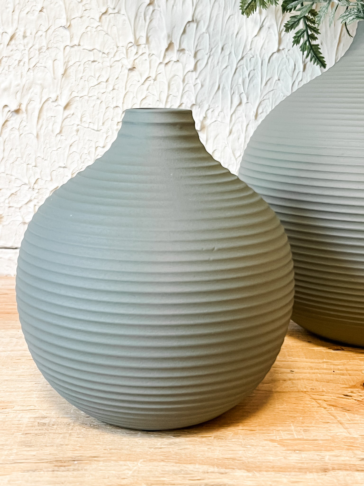 matte sleek gray ribbed metal vases at the rustic barn in killingworth ct