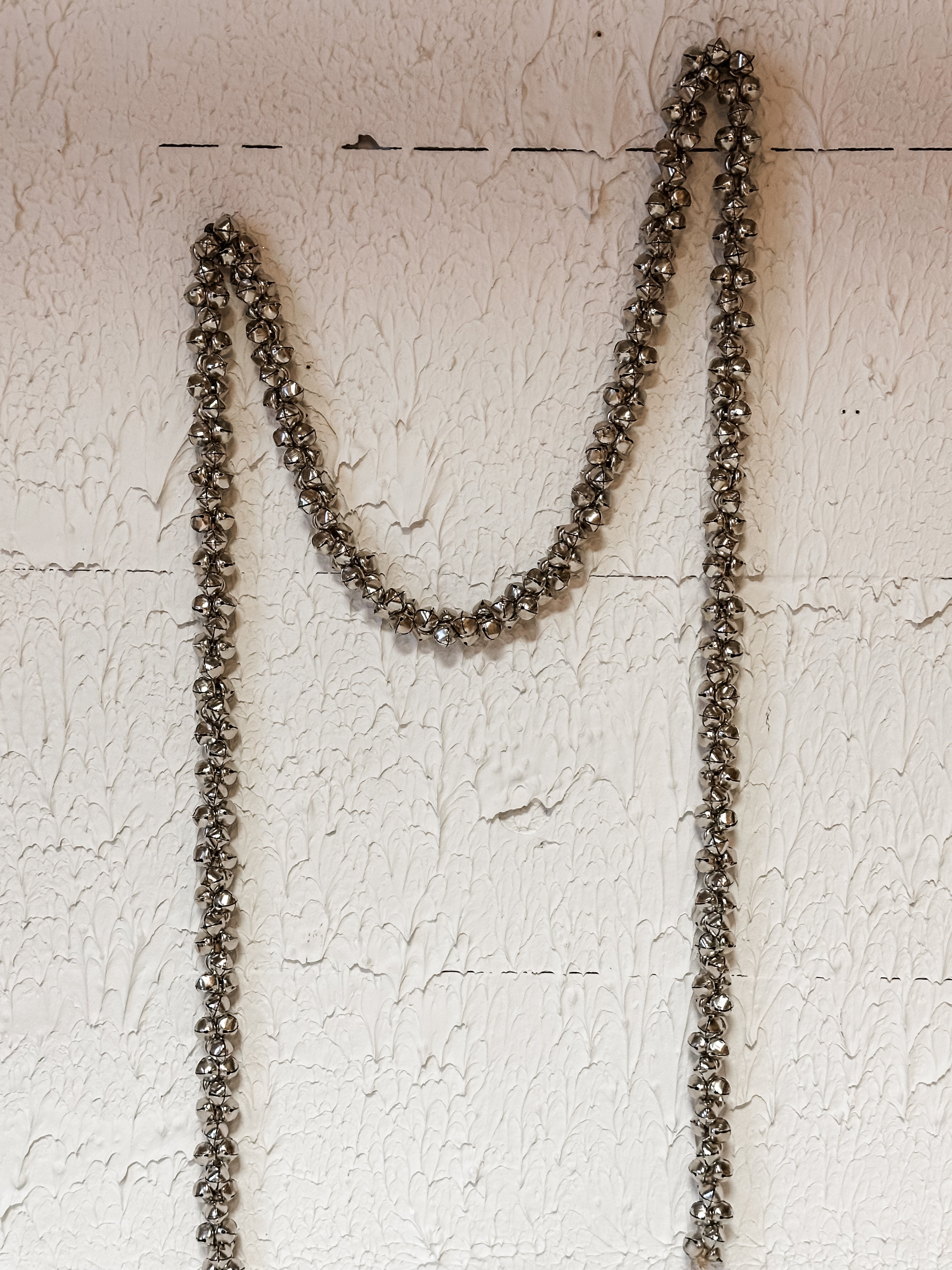 metal jingle bell garland on jute cord at The Rustic Barn in Killingworth CT