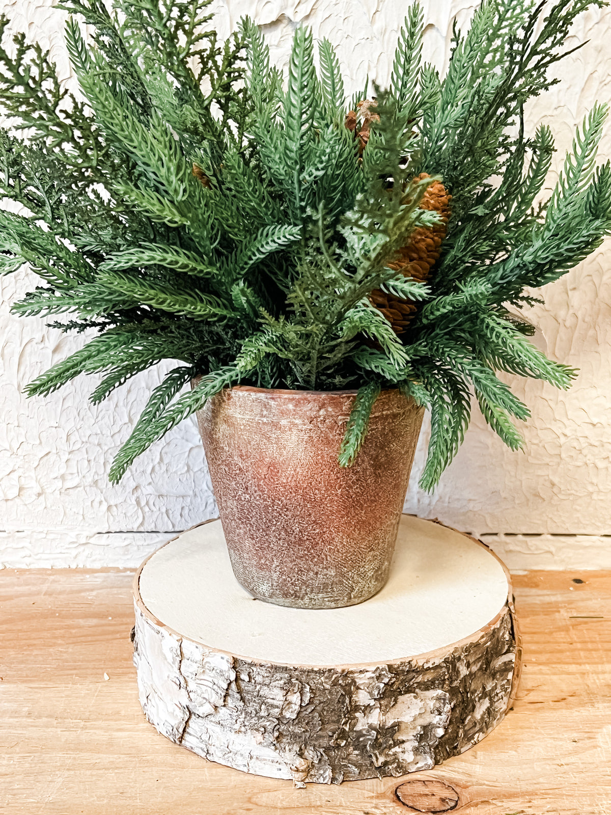 mixed pine and pinecone christmas arrangement at the rustic barn in killingworth ct