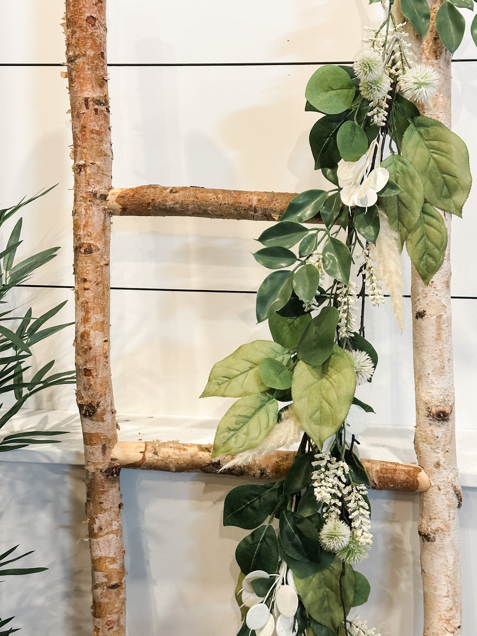 mixed silver dollar garland at the rustic barn in killingworth ct