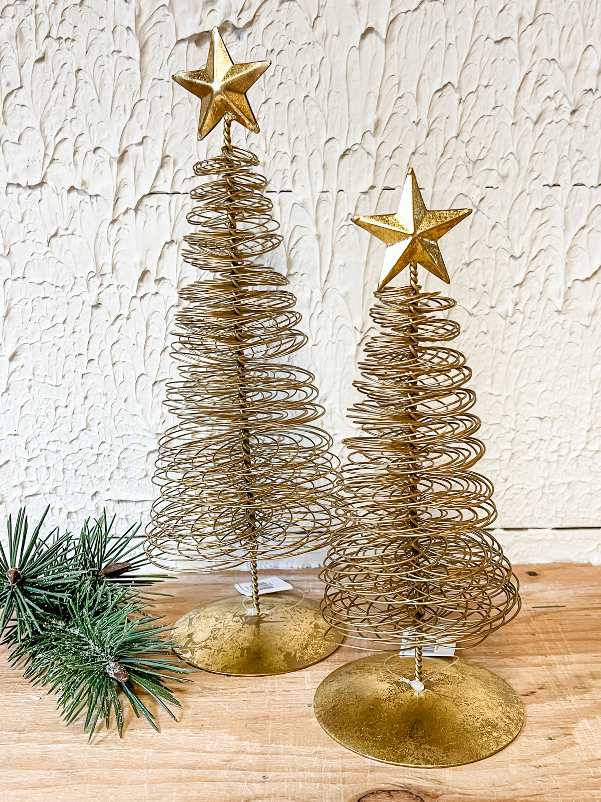 gold wired christmas tree with star on top at the rustic barn in Killingworth ct