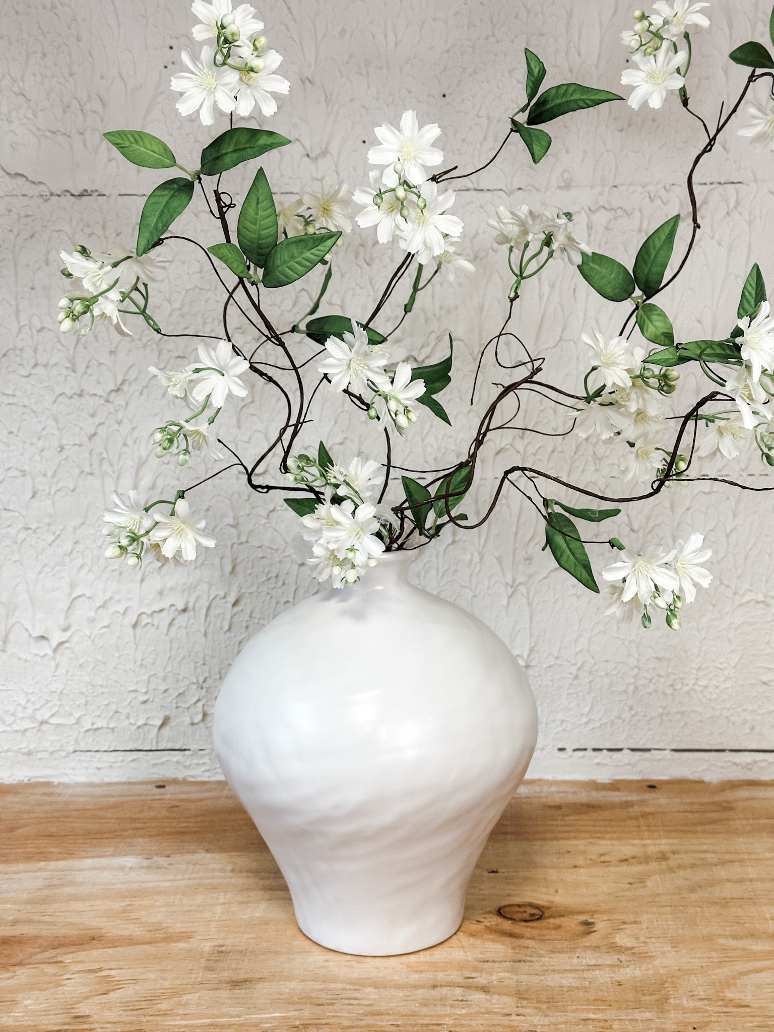 modern white ceramic vase at the rustic barn in killingworth ct