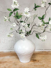 modern white ceramic vase at the rustic barn in killingworth ct