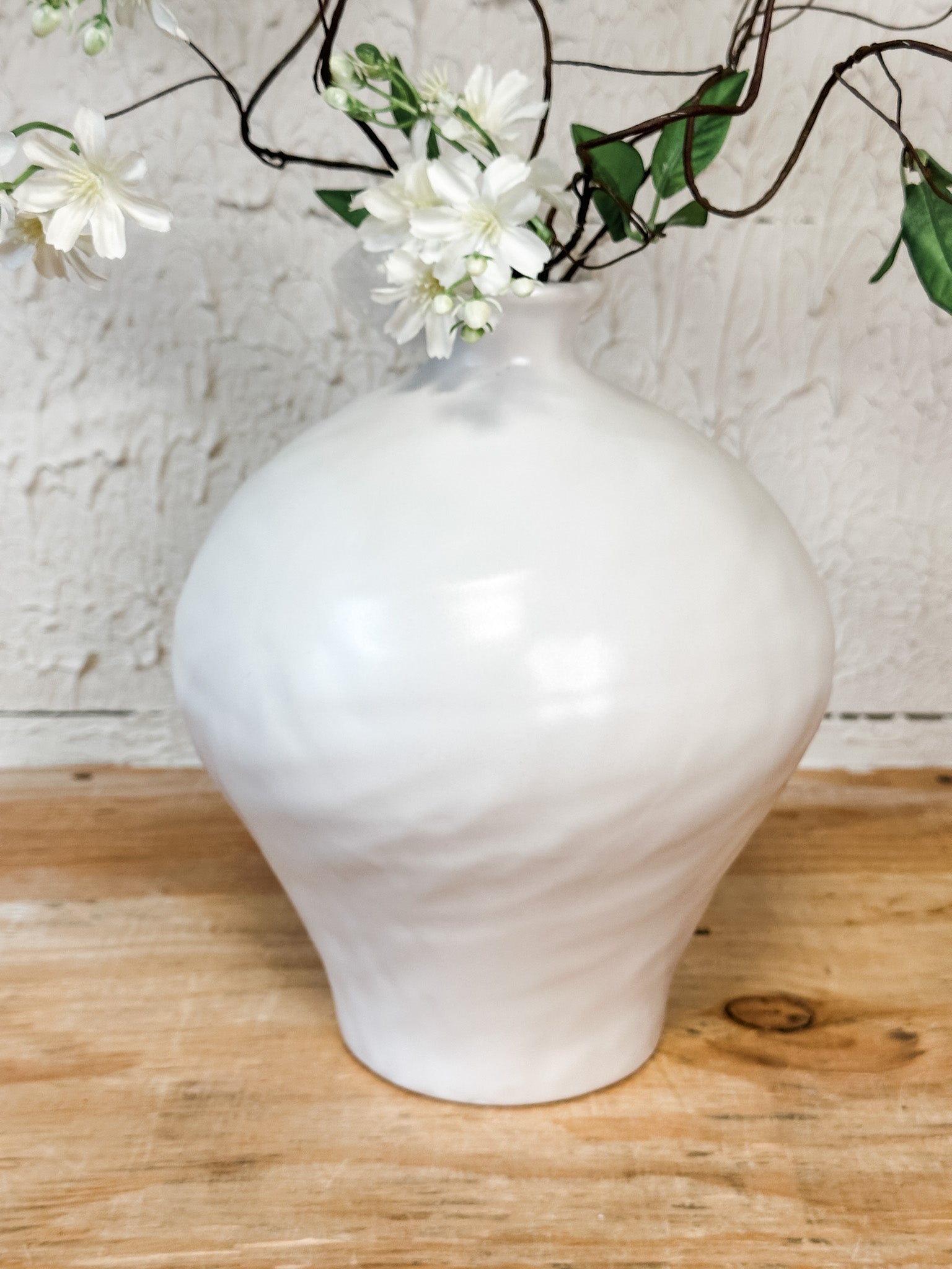 modern white ceramic vase at the rustic barn in killingworth ct