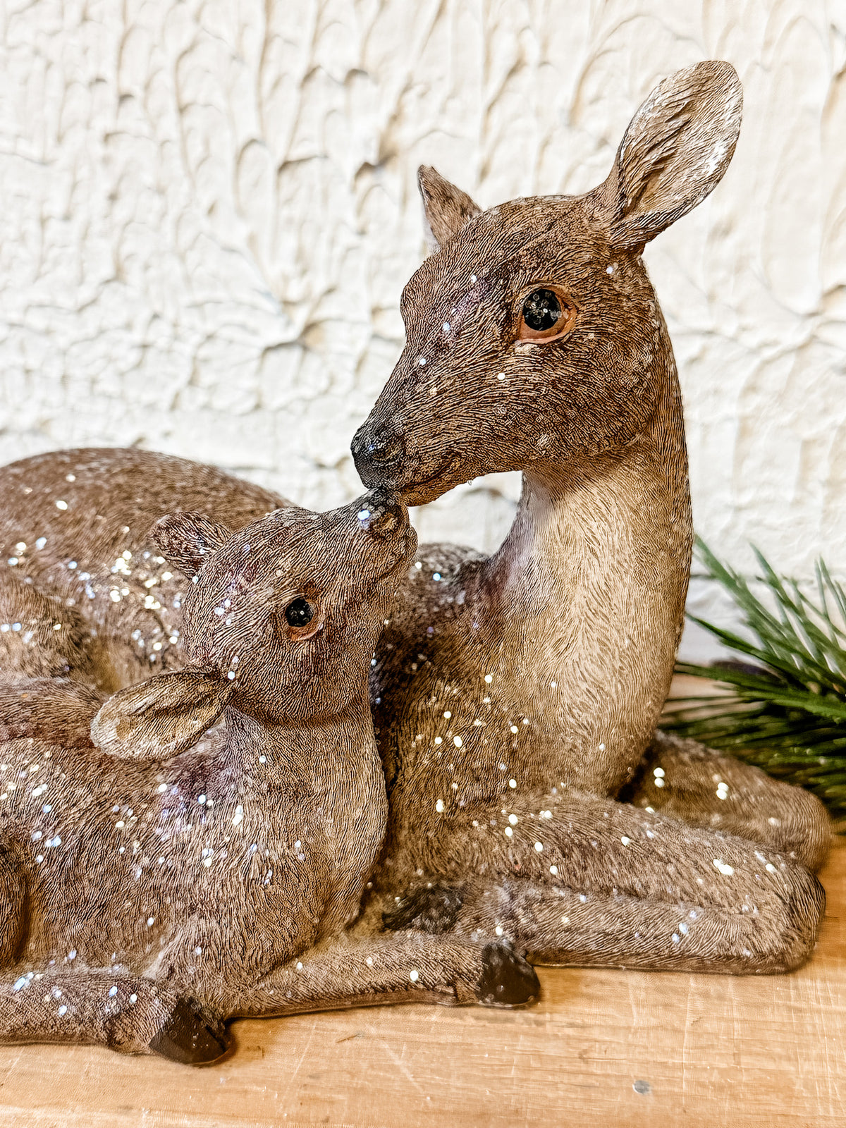 mom and baby deer kiss christmas statue home decor at the rustic barn in killingworth ct