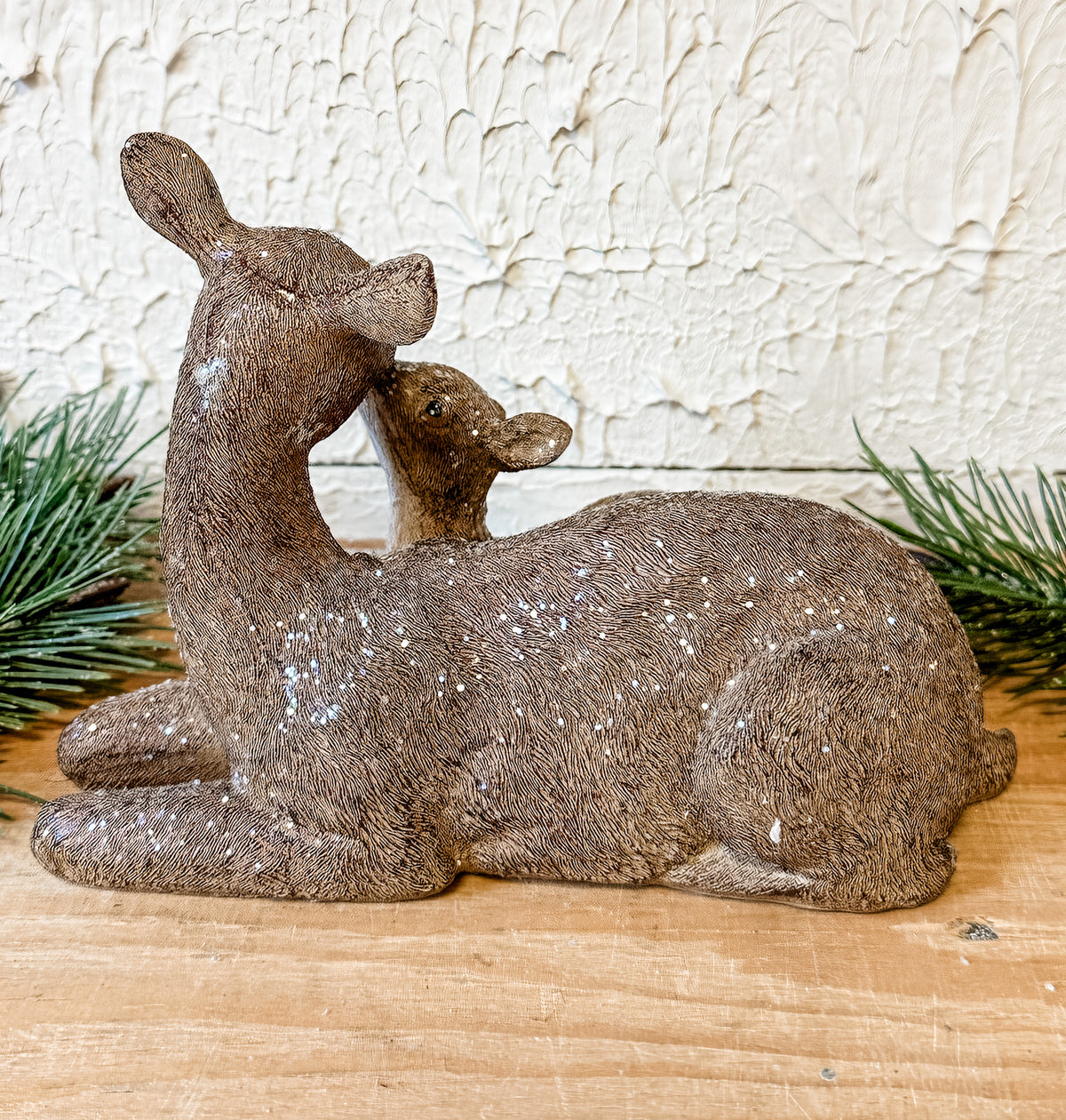 mom and baby deer kiss christmas statue home decor at the rustic barn in killingworth ct
