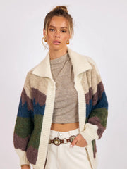 open cardigan with collar and a landscape print on it at the rustic barn in killingworth ct