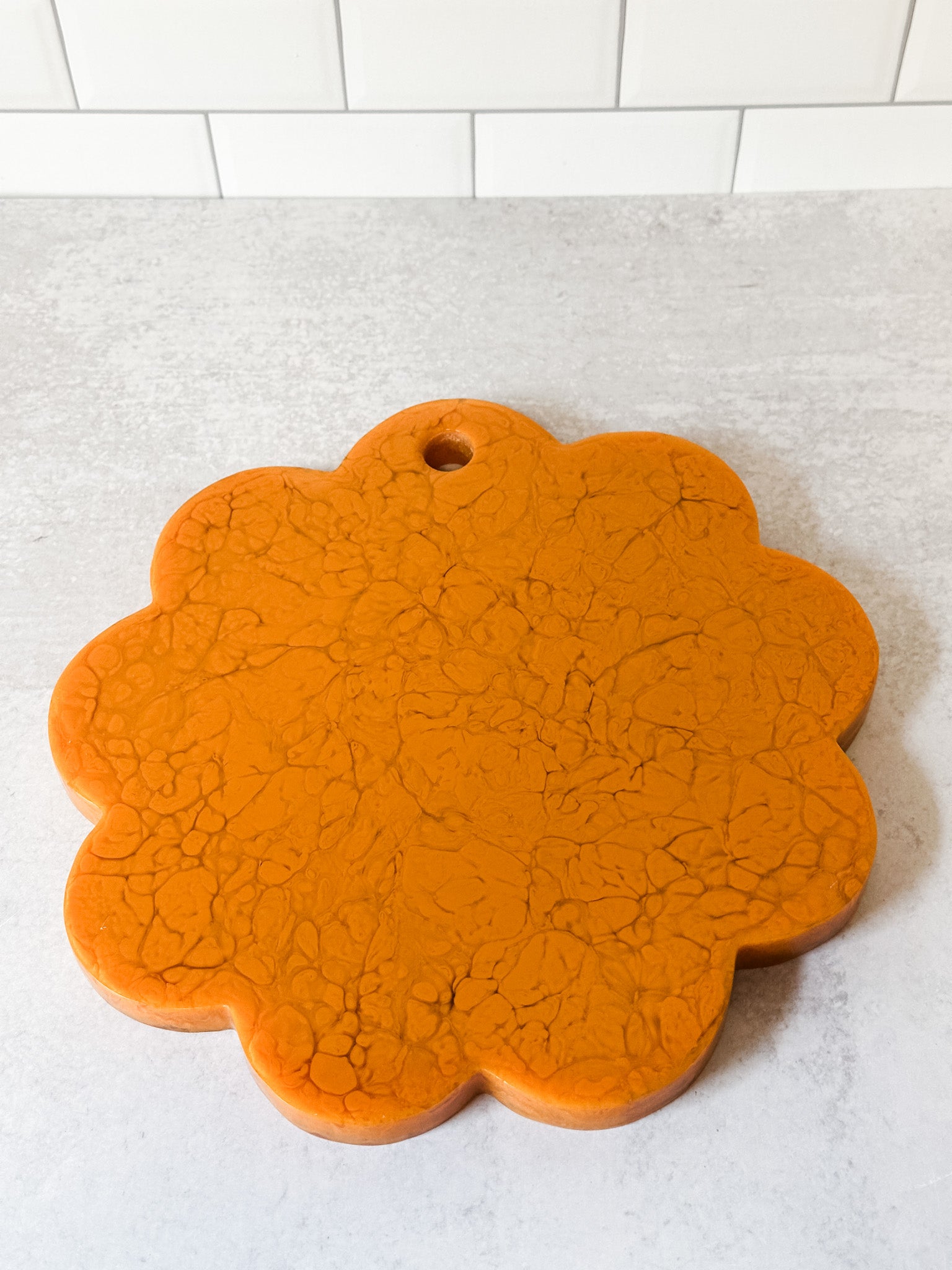 mustard marbled resin scalloped cheese board at the rustic barn in killingworth ct