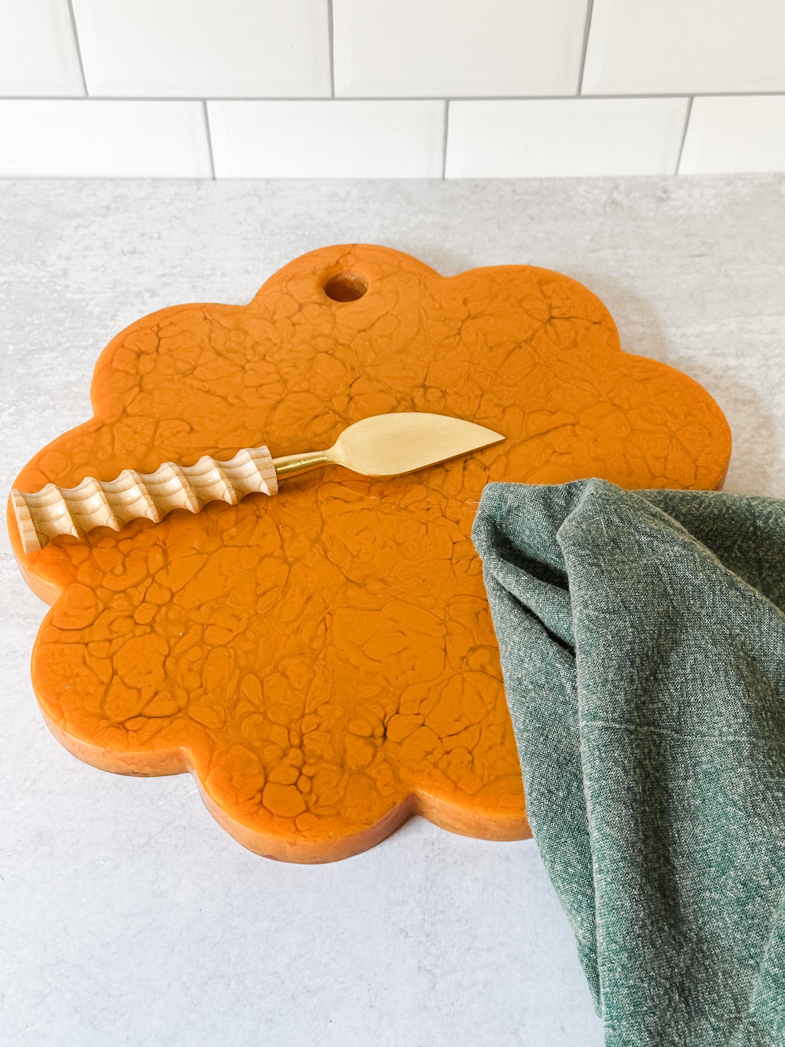mustard marbled resin scalloped cheese board at the rustic barn in killingworth ct