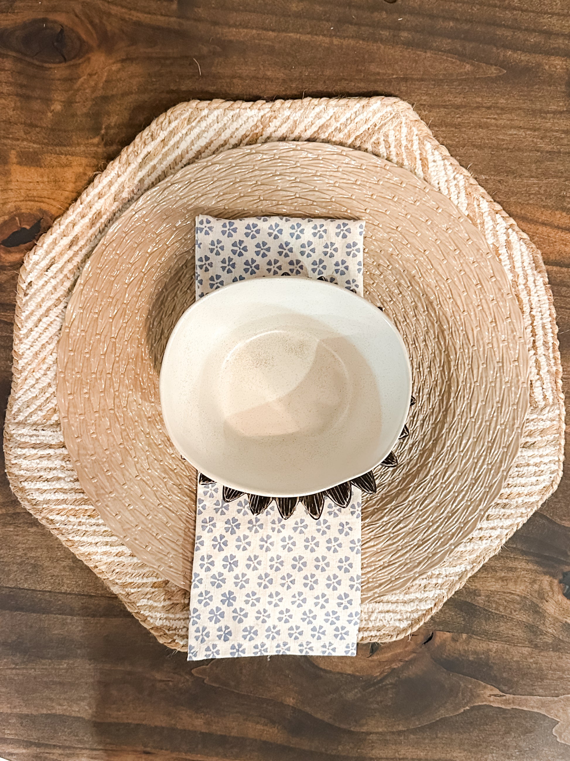 natural and white cotton and jute octagon shaped placemat at the rustic barn in killingworth ct 
