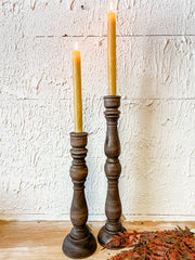 espresso color wood taper candle holder at the rustic barn in killingworth ct