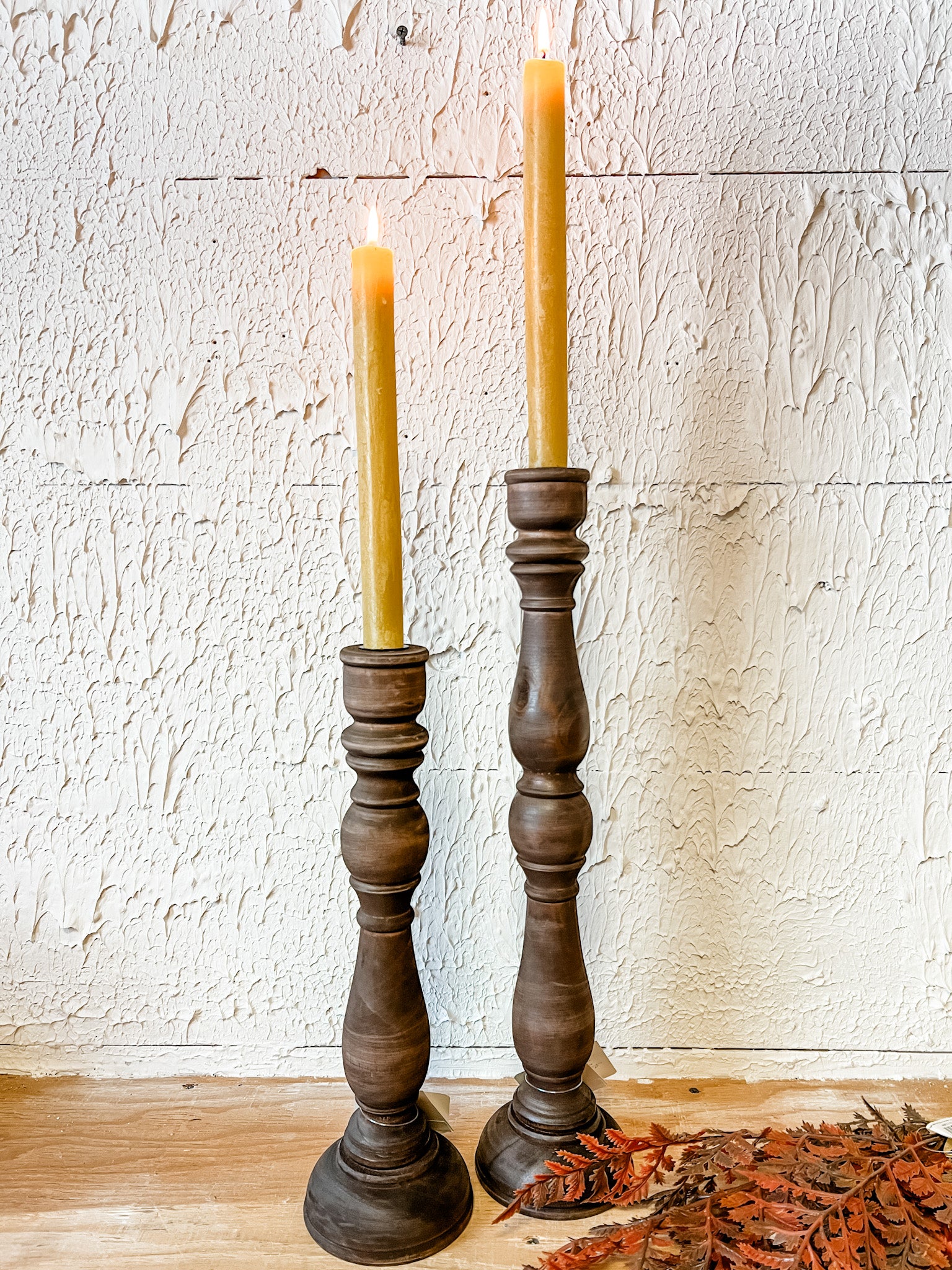 espresso color wood taper candle holder at the rustic barn in killingworth ct