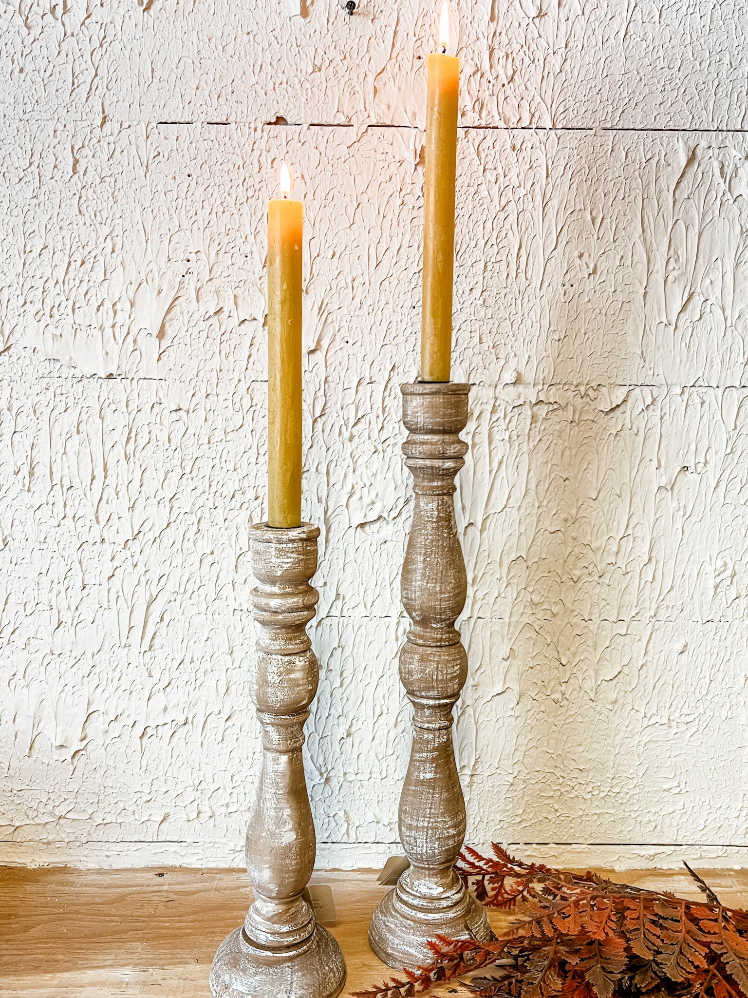 natural wood taper candle holders at the rustic barn in killingworth ct