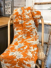 orange and blue cotton stitch quilt throw at the rustic barn in killingworth ct