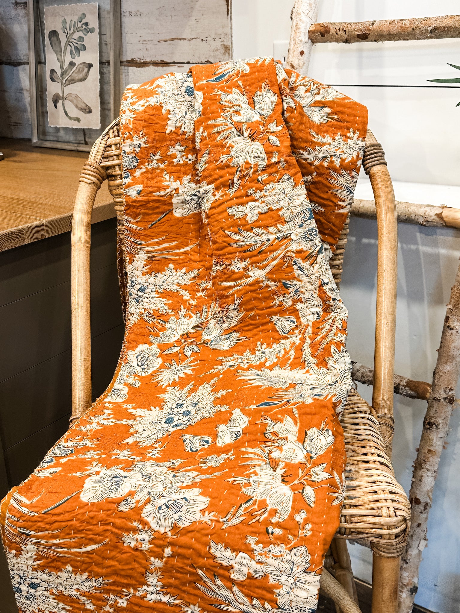 orange and blue cotton stitch quilt throw at the rustic barn in killingworth ct
