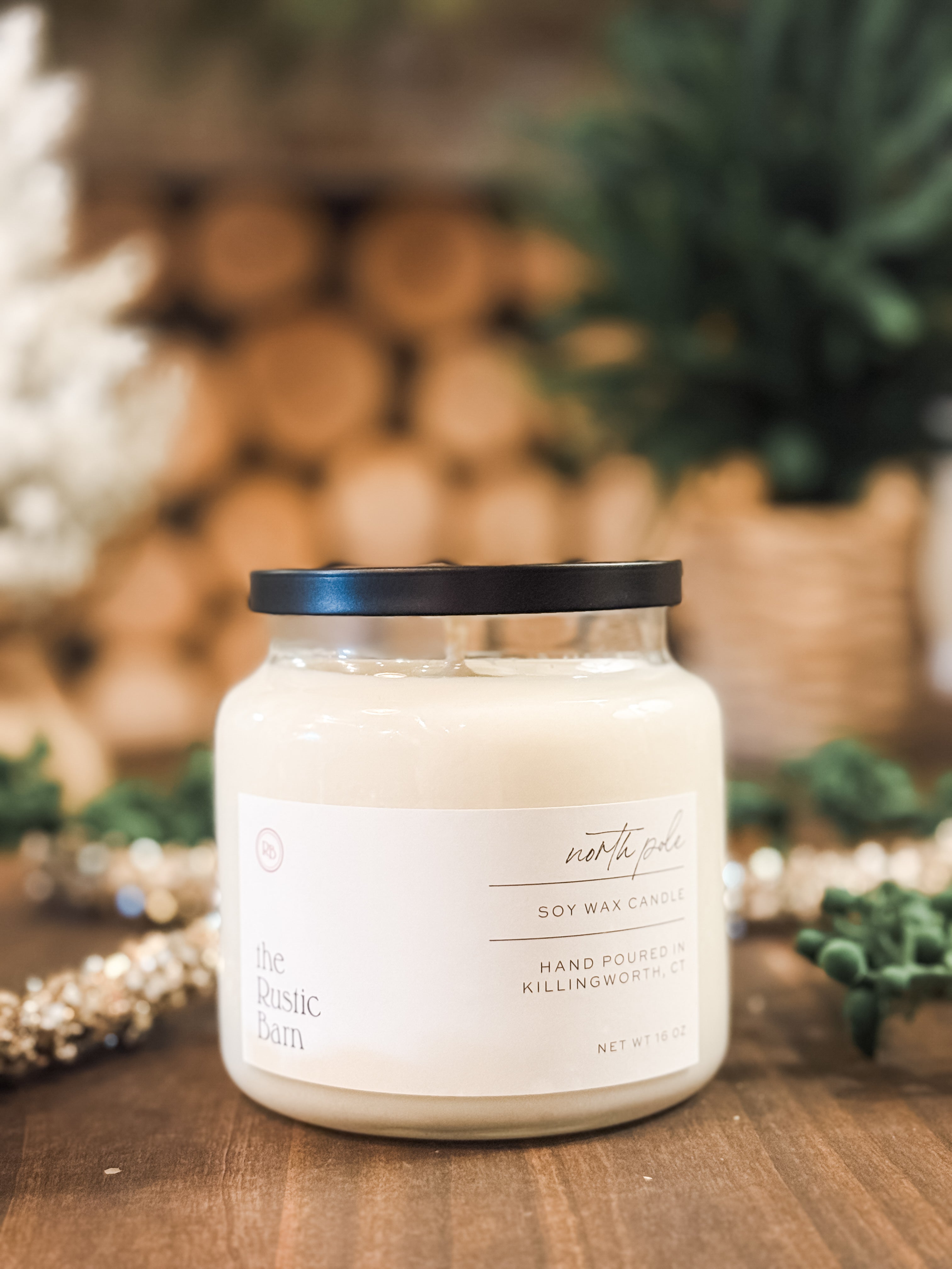 orange spice, fire and pine scented hand-poured 16 ounce soy candle at The Rustic Barn in Killingworth CT