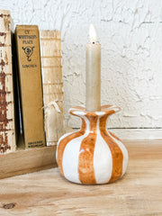 orange striped ceramic taper holder at the rustic barn in killingworth ct