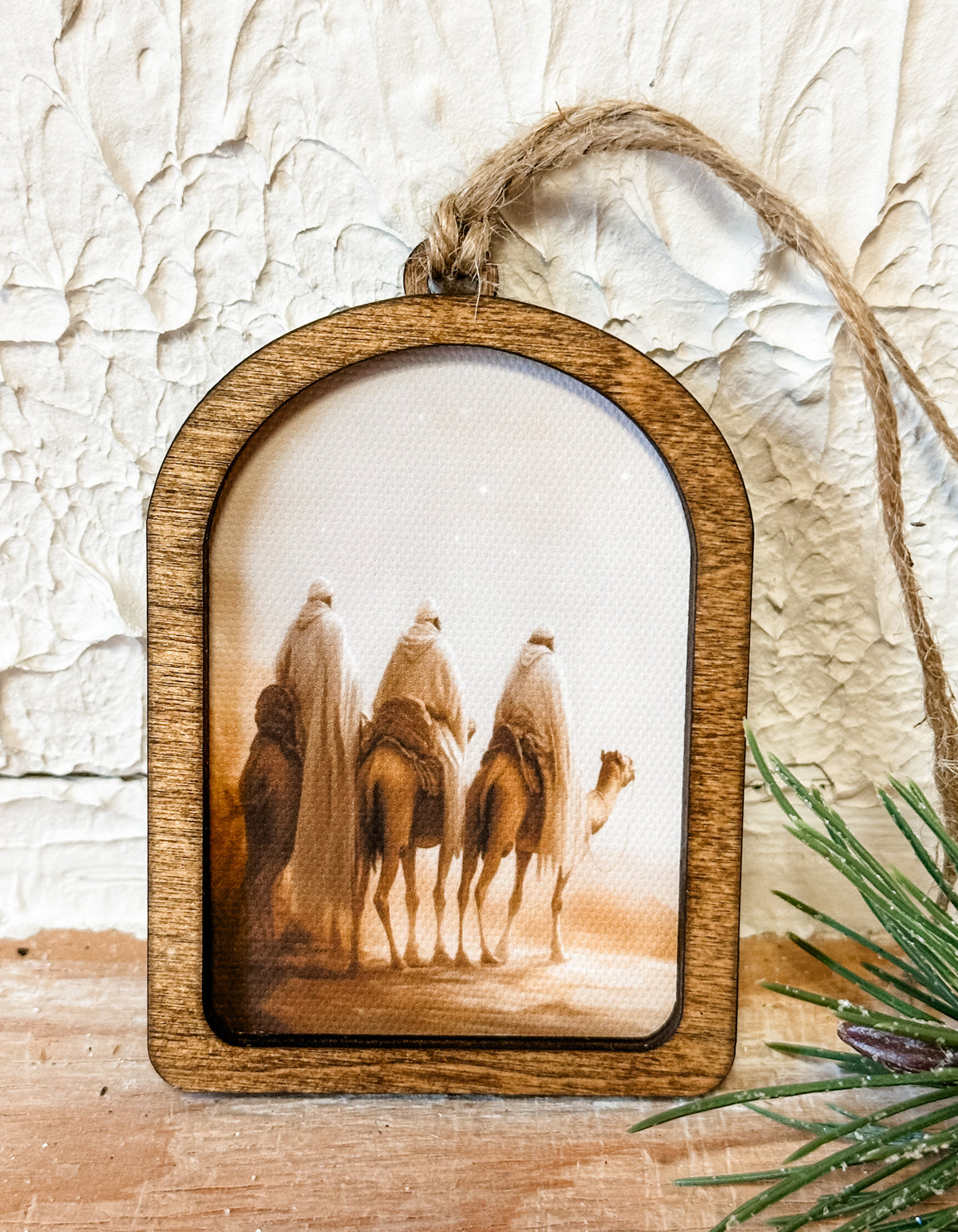 wooden ornament with a picture of 3 wise men on camels at the rustic barn in killingworth ct