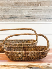 oval wicker baskets with handles at The Rustic Barn in Killingworth, CT
