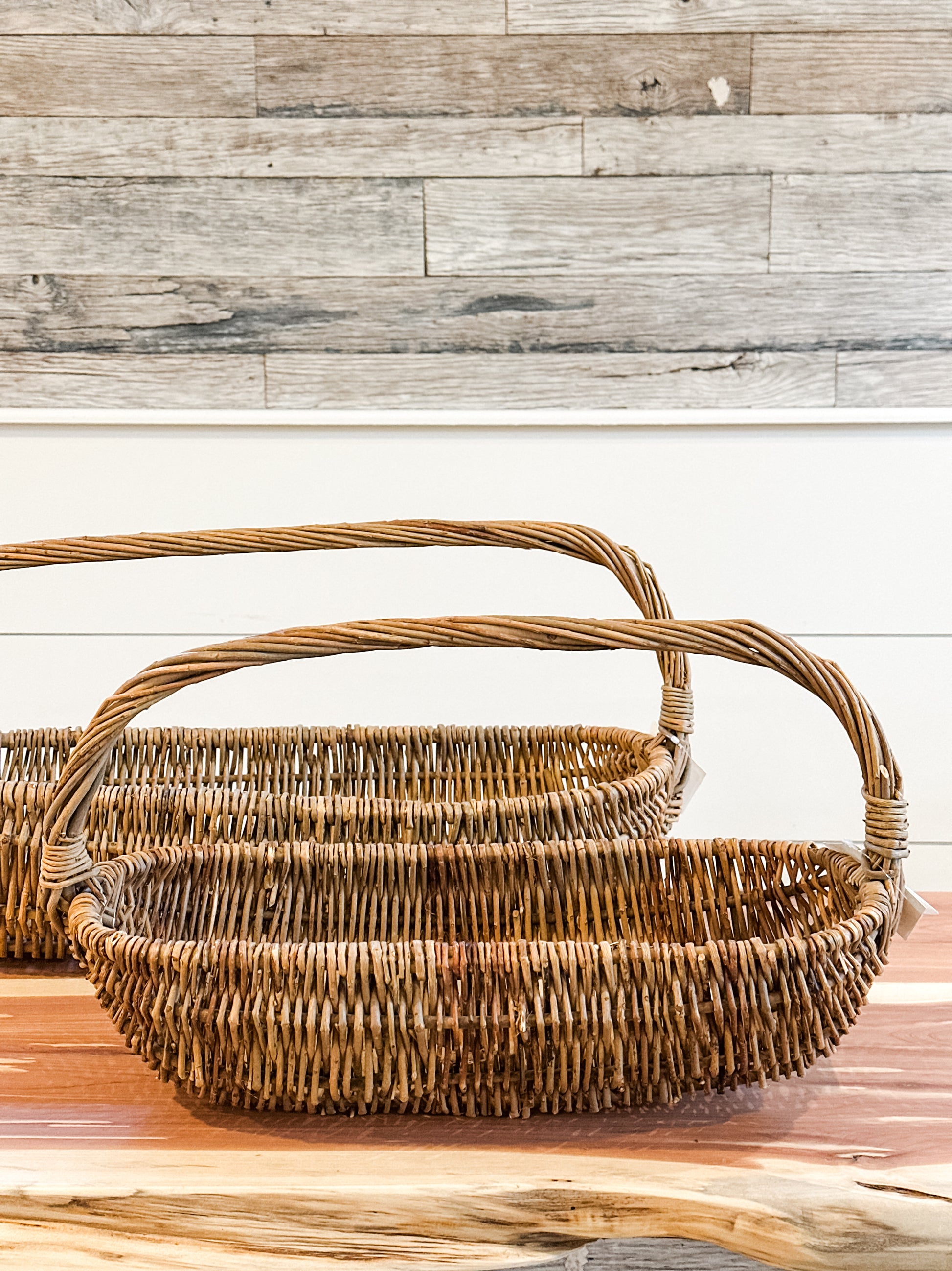 oval wicker baskets with handles at The Rustic Barn in Killingworth, CT