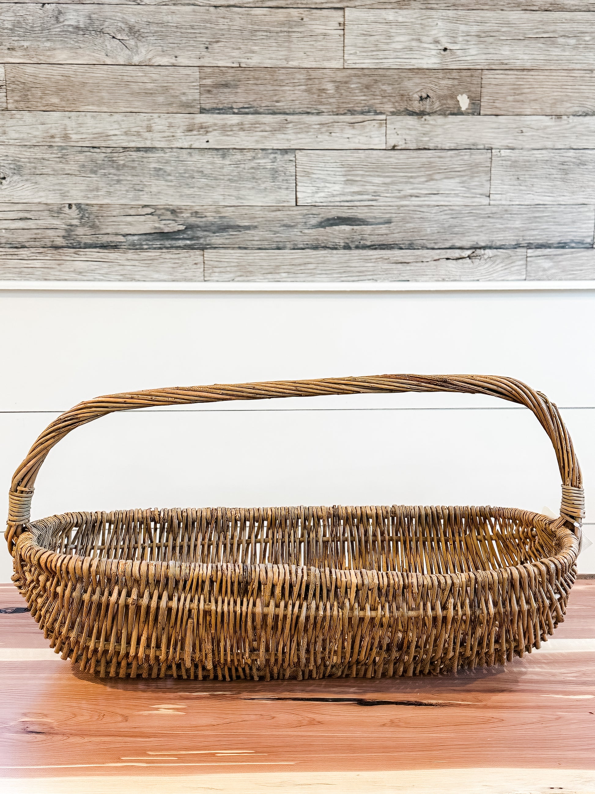 oval wicker baskets with handles at The Rustic Barn in Killingworth, CT