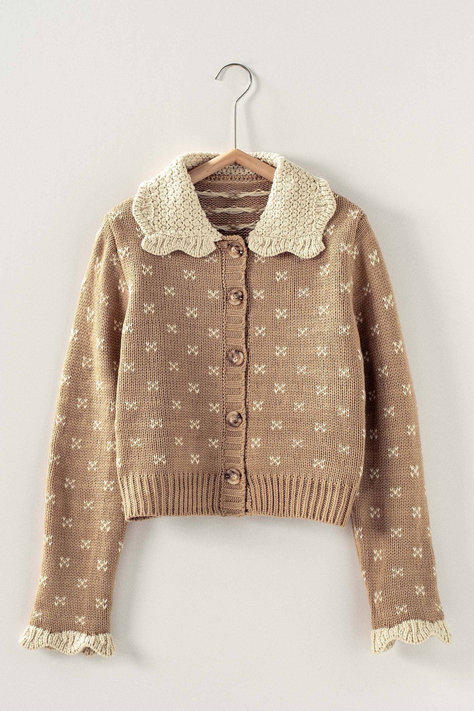 knit cardigan with ruffles on the collar and sleeve at the rustic barn in Killingworth ct