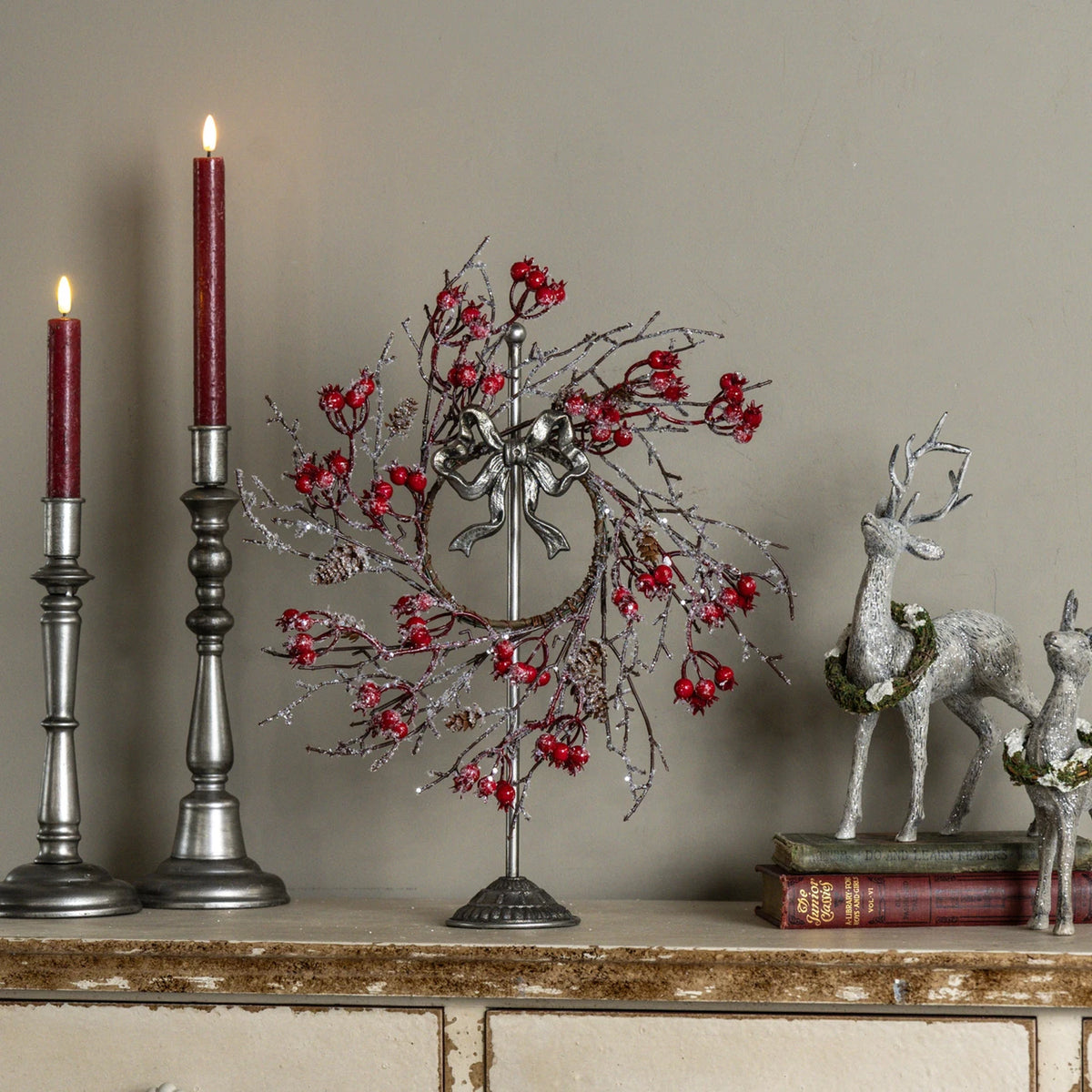 pewter wreath stand with bow at the rustic barn in killingworth ct