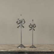 pewter wreath stand with bow at the rustic barn in killingworth ct