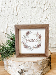pinecone wreath peace framed wall art for christmas for sale at the rustic barn in Killingworth, CT