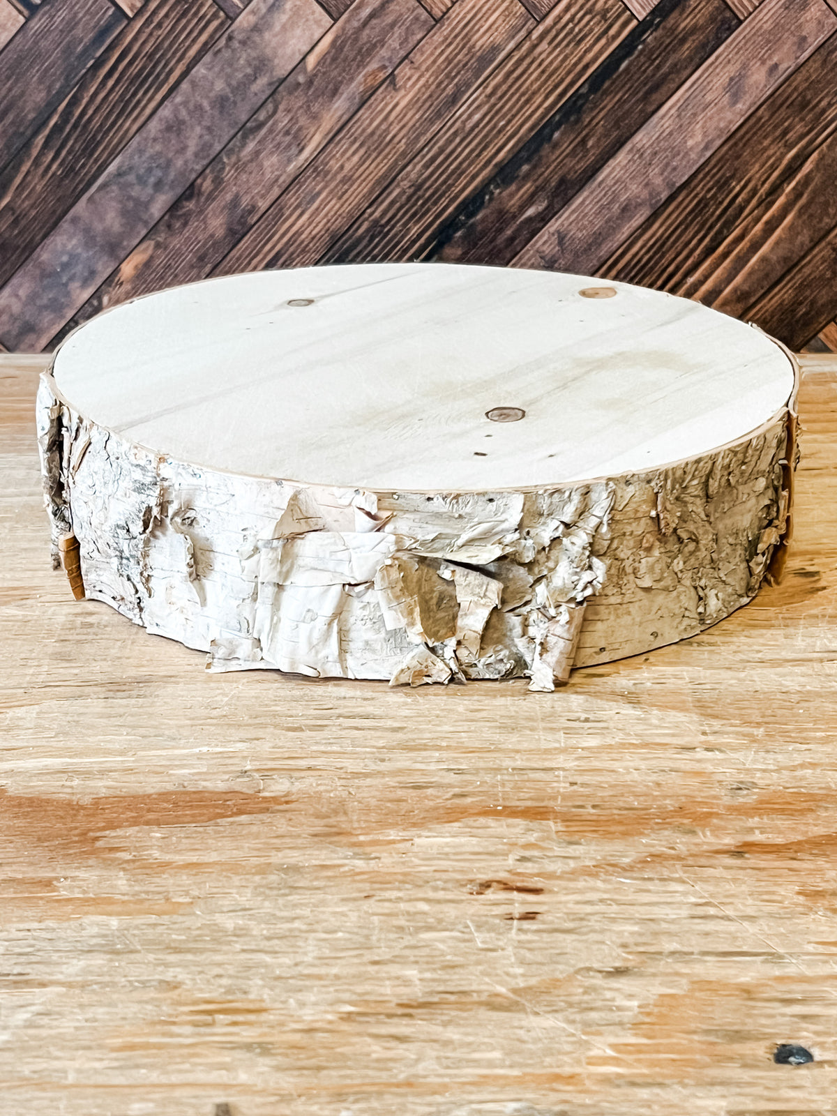 a round poplar wooden round birch riser at the rustic barn in killingworth ct