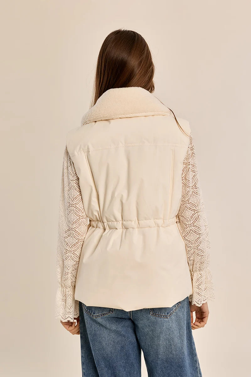 quilted vest with a plush collar in cream color at the rustic barn in killingworth ct