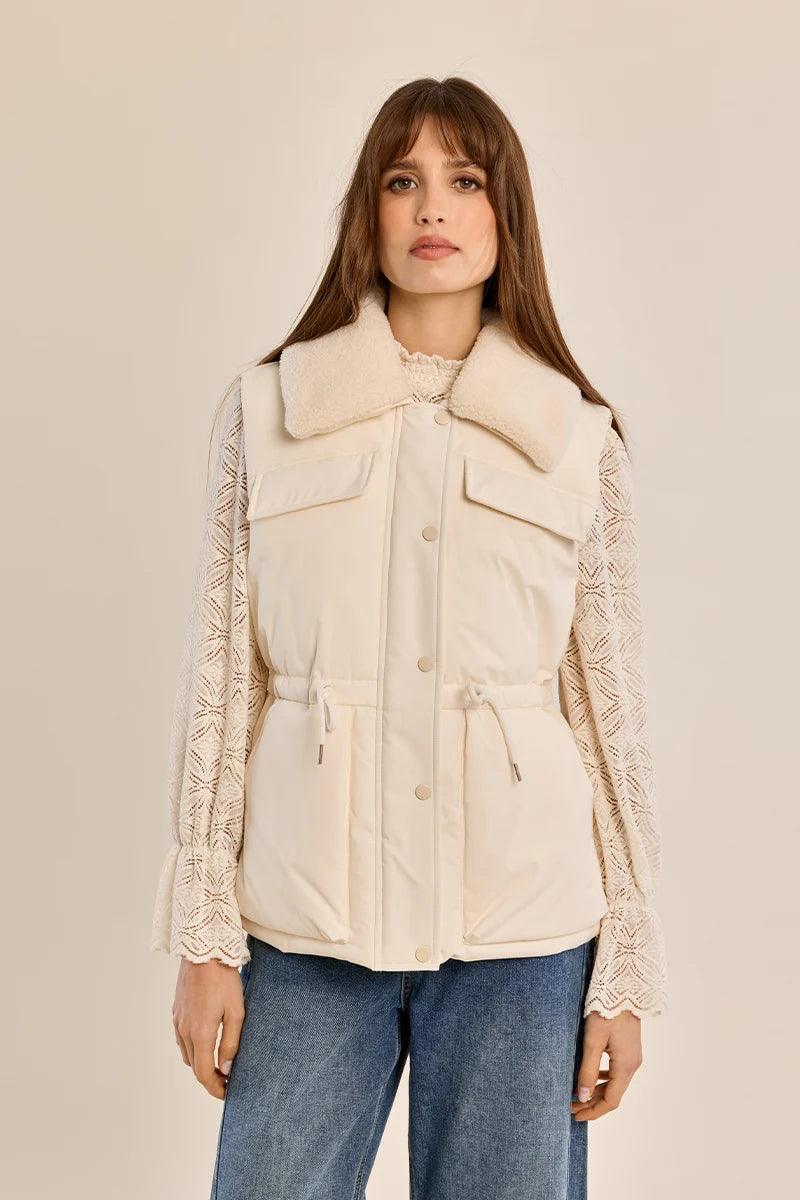 quilted vest with a plush collar in cream color at the rustic barn in killingworth ct