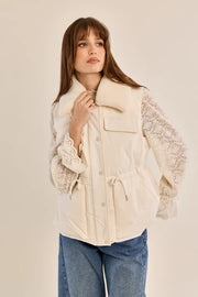 quilted vest with a plush collar in cream color at the rustic barn in killingworth ct
