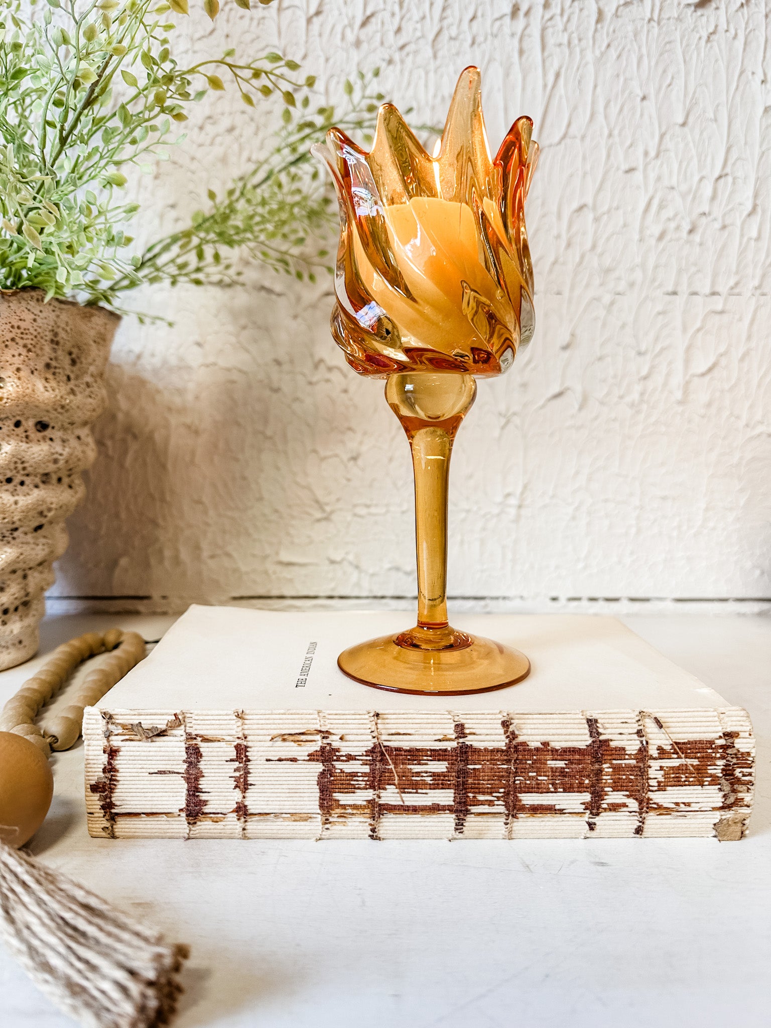golden glass tulip votive holder at the rustic barn in killingworth ct