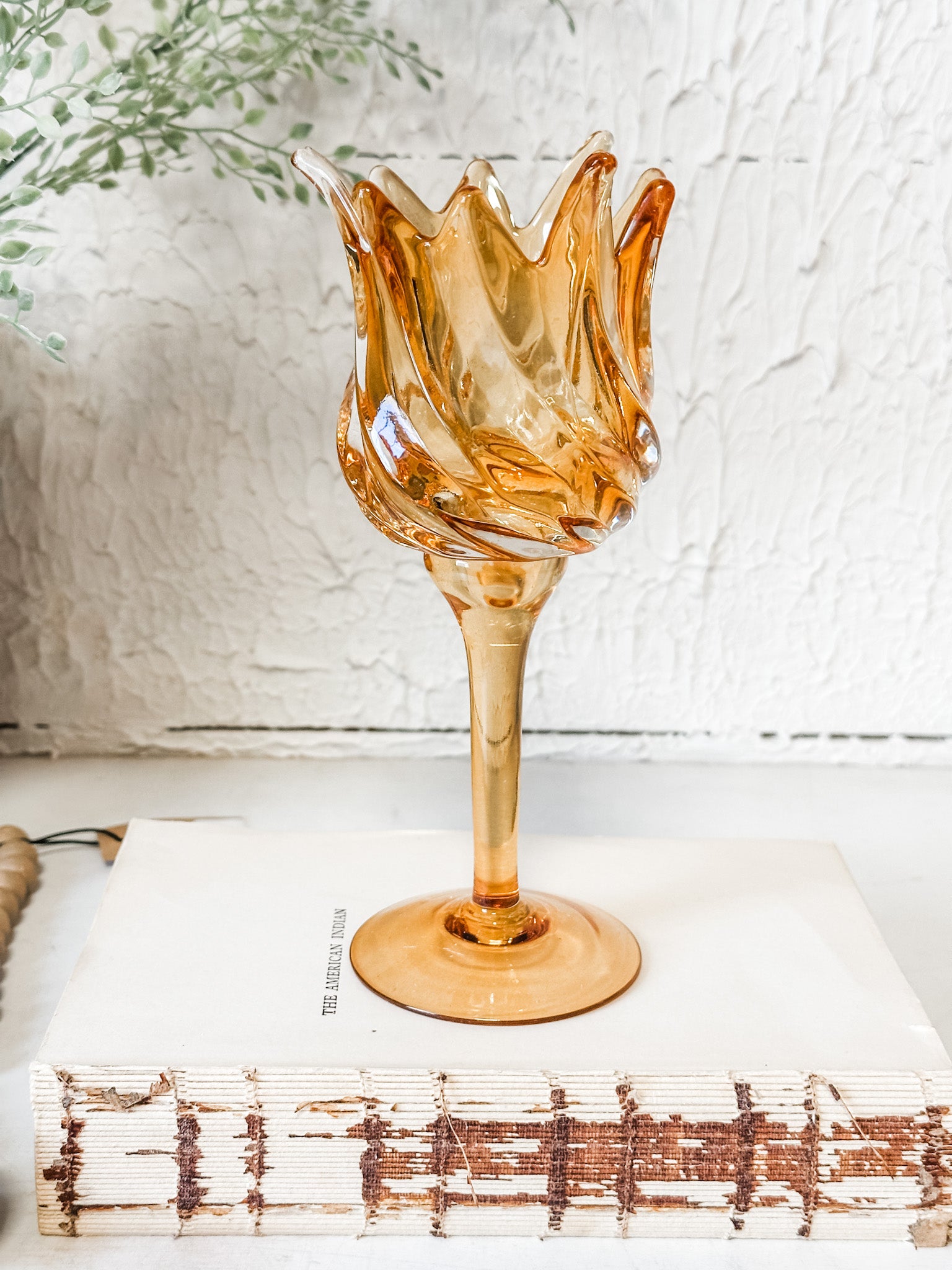 golden glass tulip votive holder at the rustic barn in killingworth ct