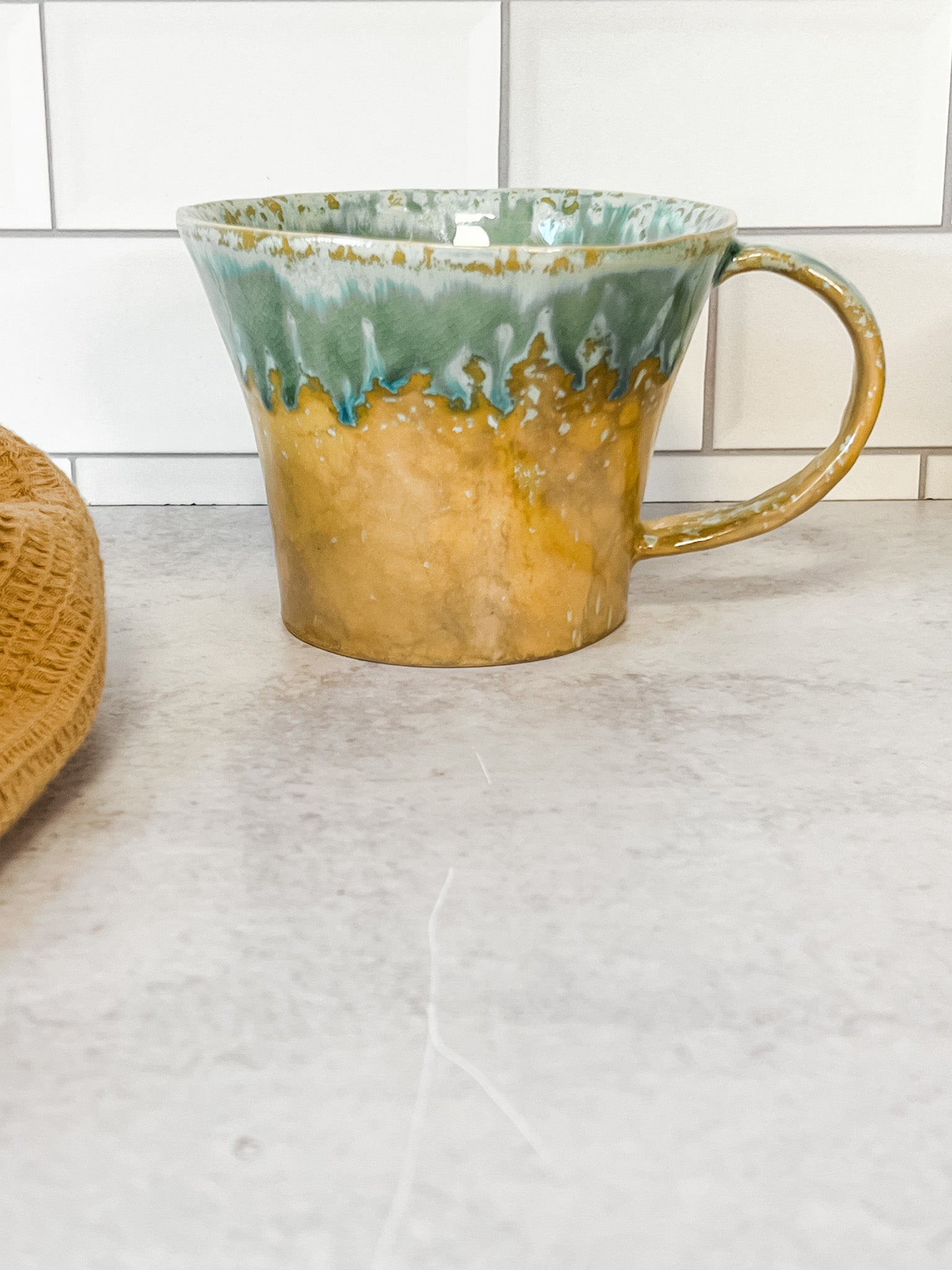 moss green stoneware mugs with reactive glaze at the rustic barn in killingworth ct