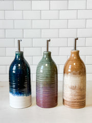 reactive glaze stoneware oil cruet with stainless steel spout at the Rustic Barn in Killingworth, CT