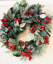 red berry holly and pine christmas wreath at the rustic barn in killingworth ct