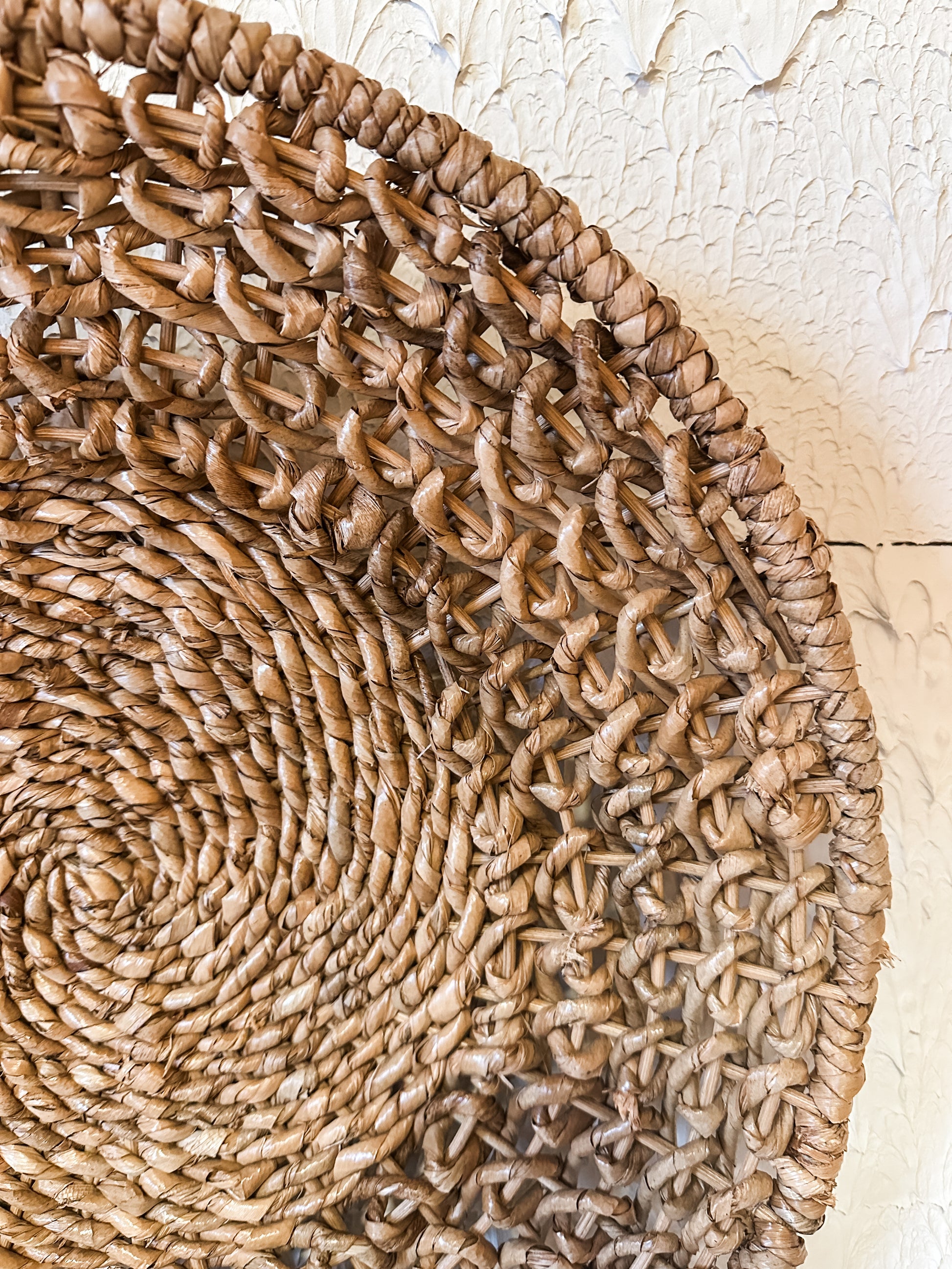 18-1/4” round natural woven rattan wall decor at The Rustic Barn in Killingworth CT