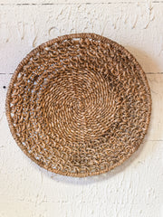 18-1/4” round natural woven rattan wall decor at The Rustic Barn in Killingworth CT