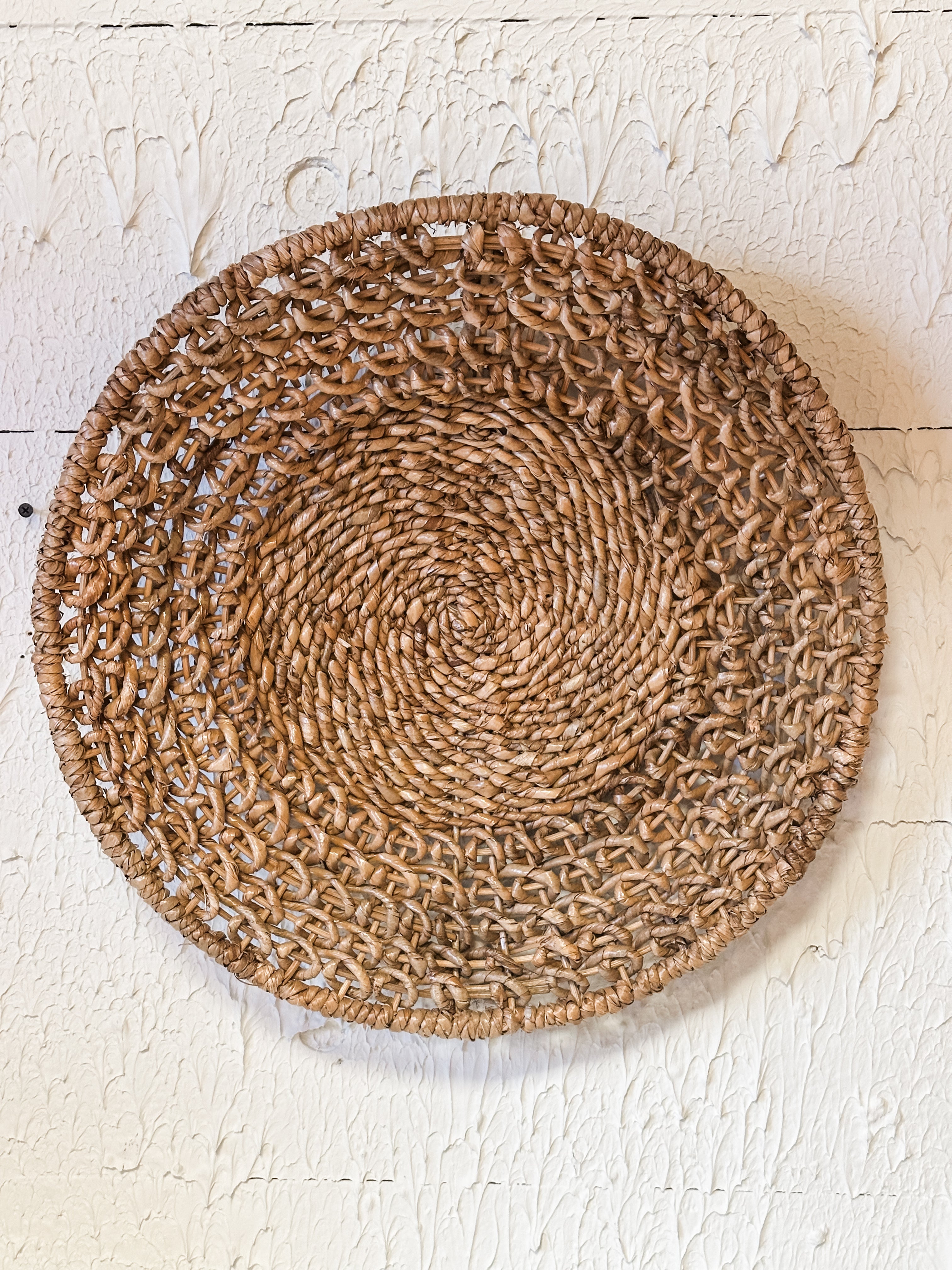 18-1/4” round natural woven rattan wall decor at The Rustic Barn in Killingworth CT