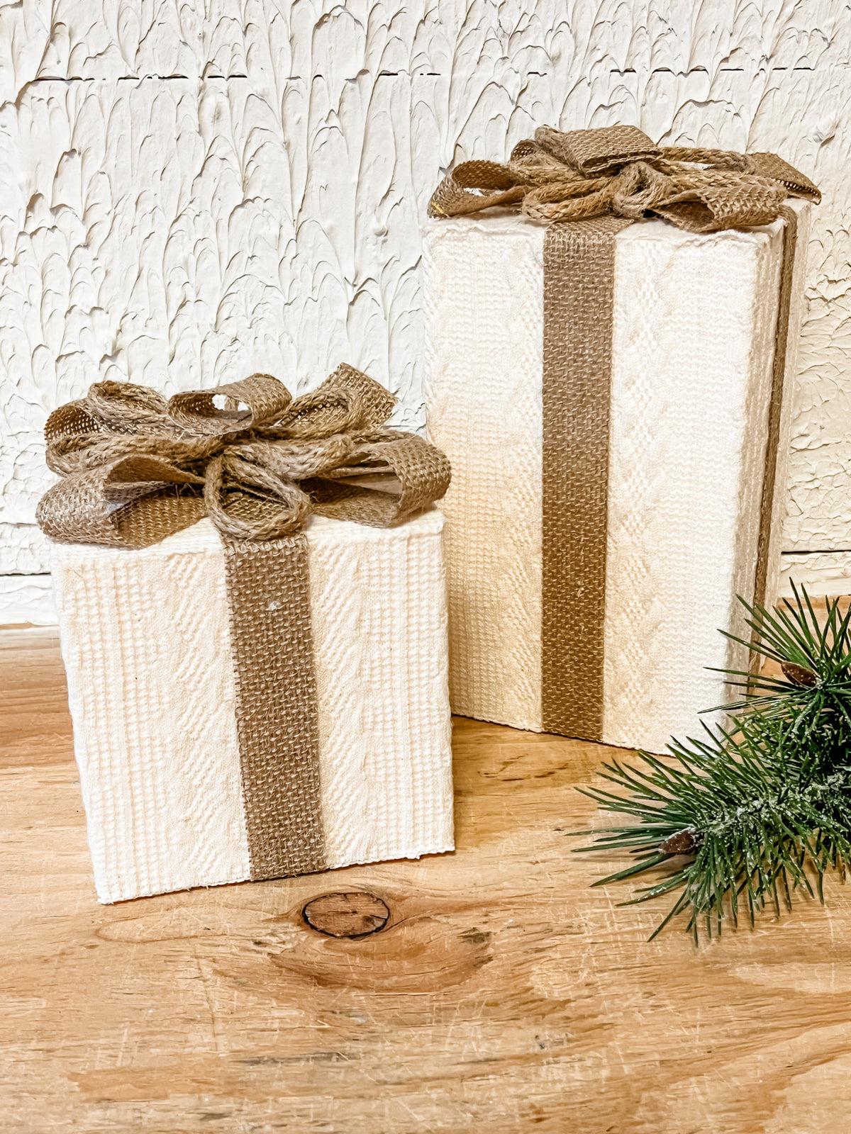 rustic sweater and burlap ribbon wrapped presents at the rustic barn in killingworth ct